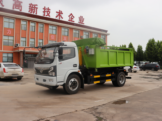 Large hook arm garbage truck